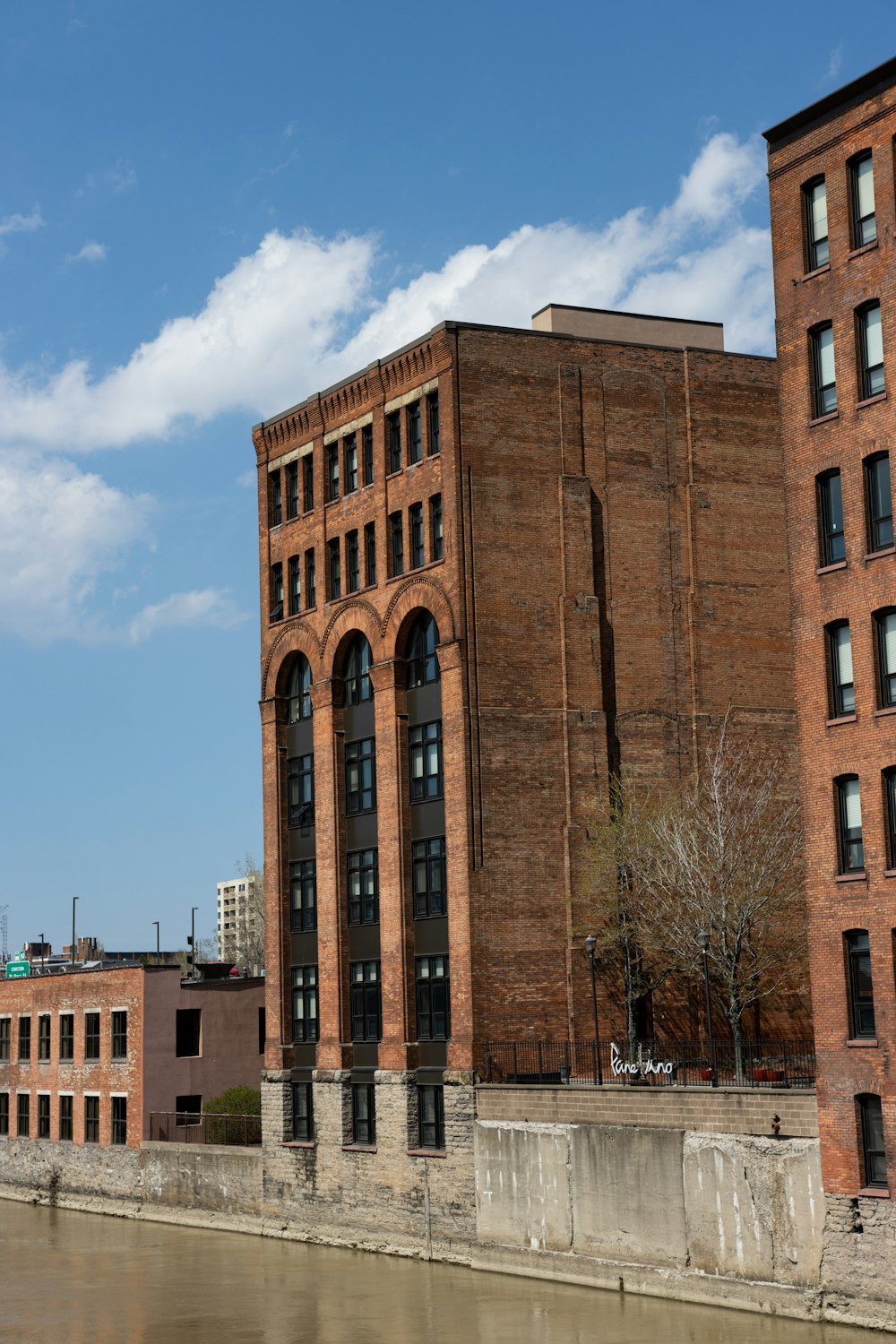 brown concrete building under blue sky during daytime