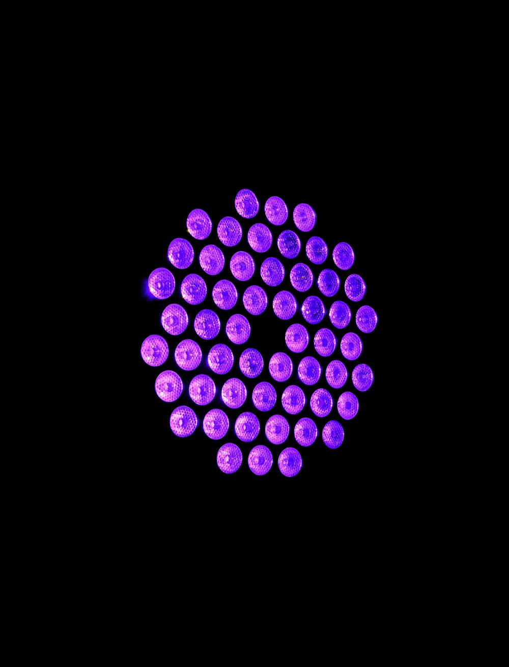 purple round lights on black background