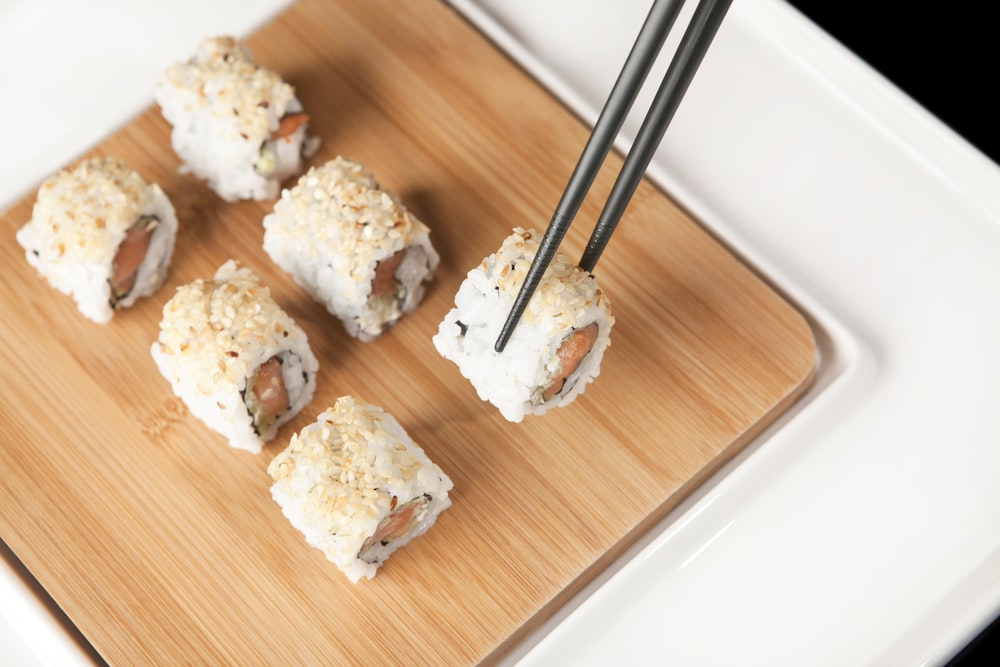 white rice on brown wooden tray