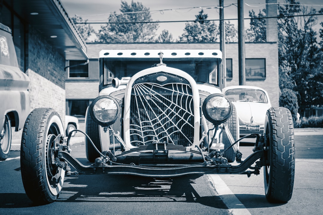 grayscale photo of vintage car