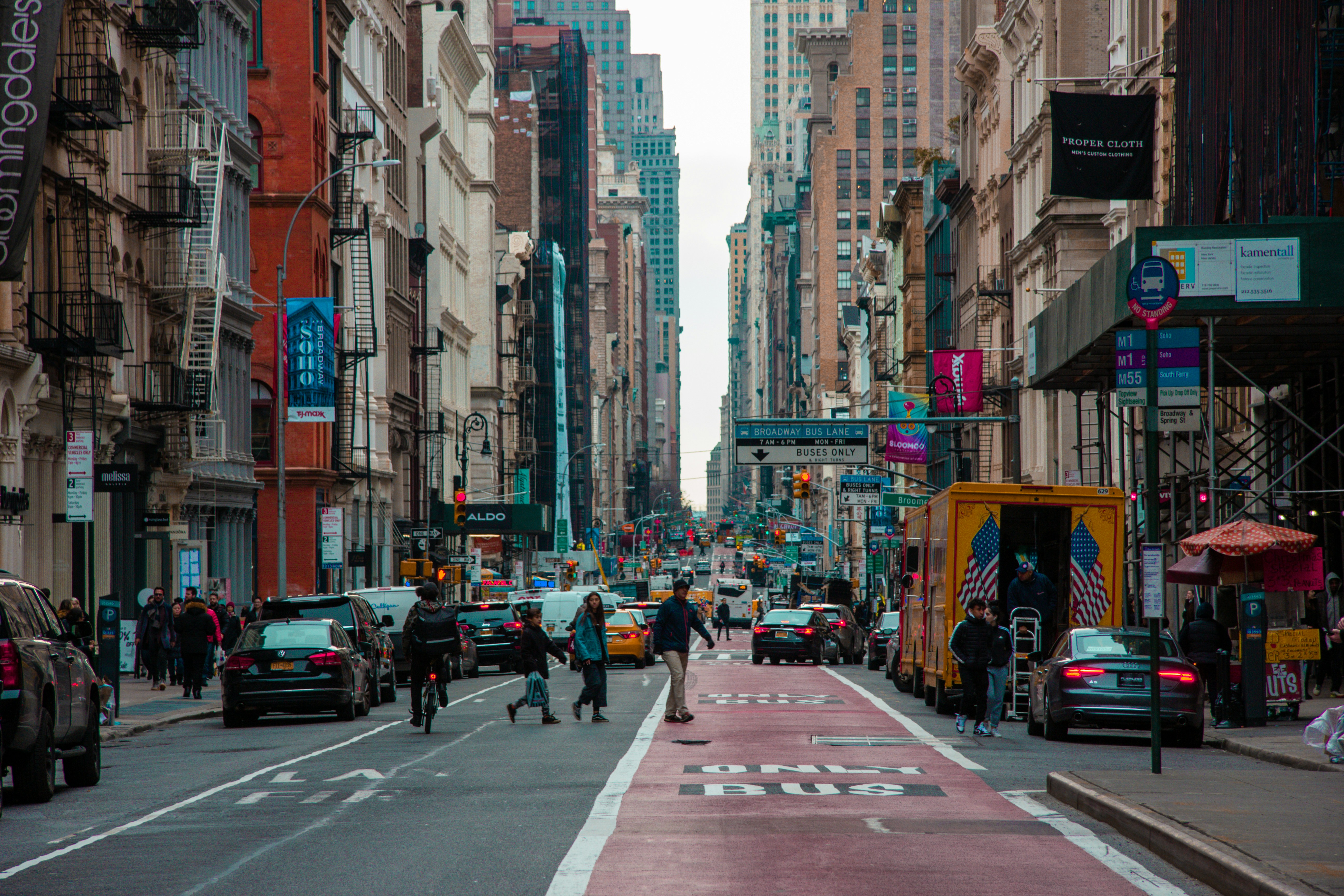 people walking on pedestrian lane during daytime, 