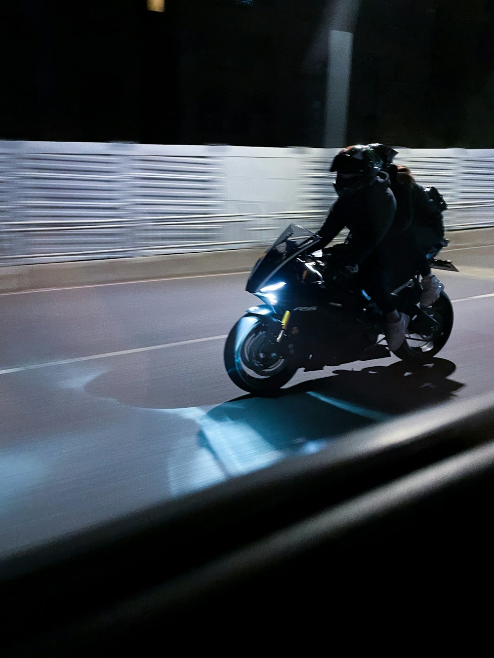 man in black jacket riding motorcycle