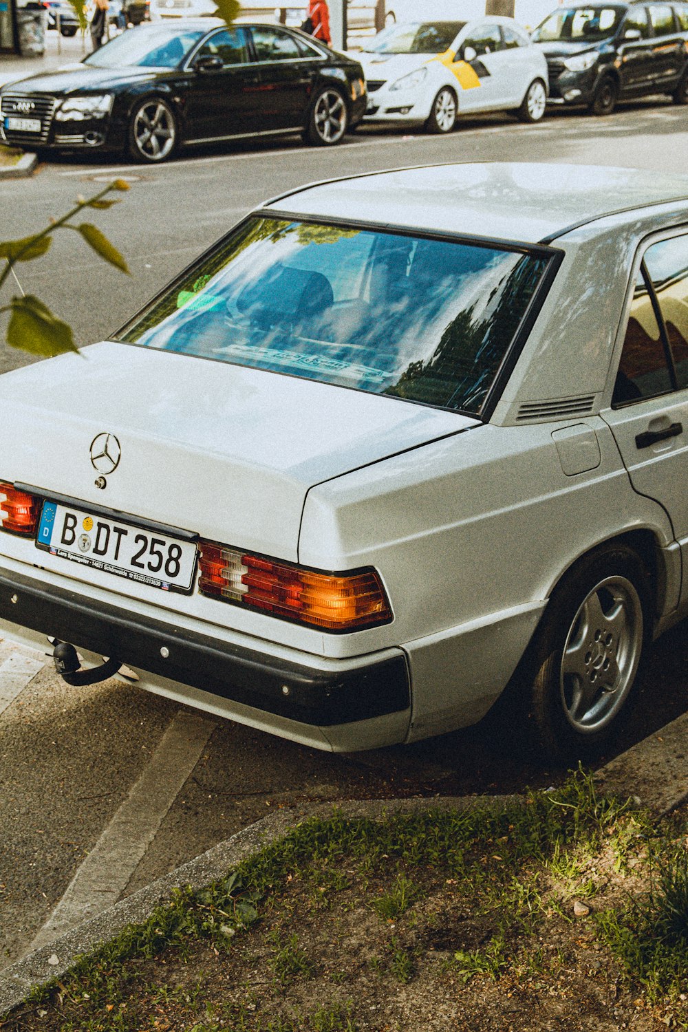 white bmw m 3 on road during daytime