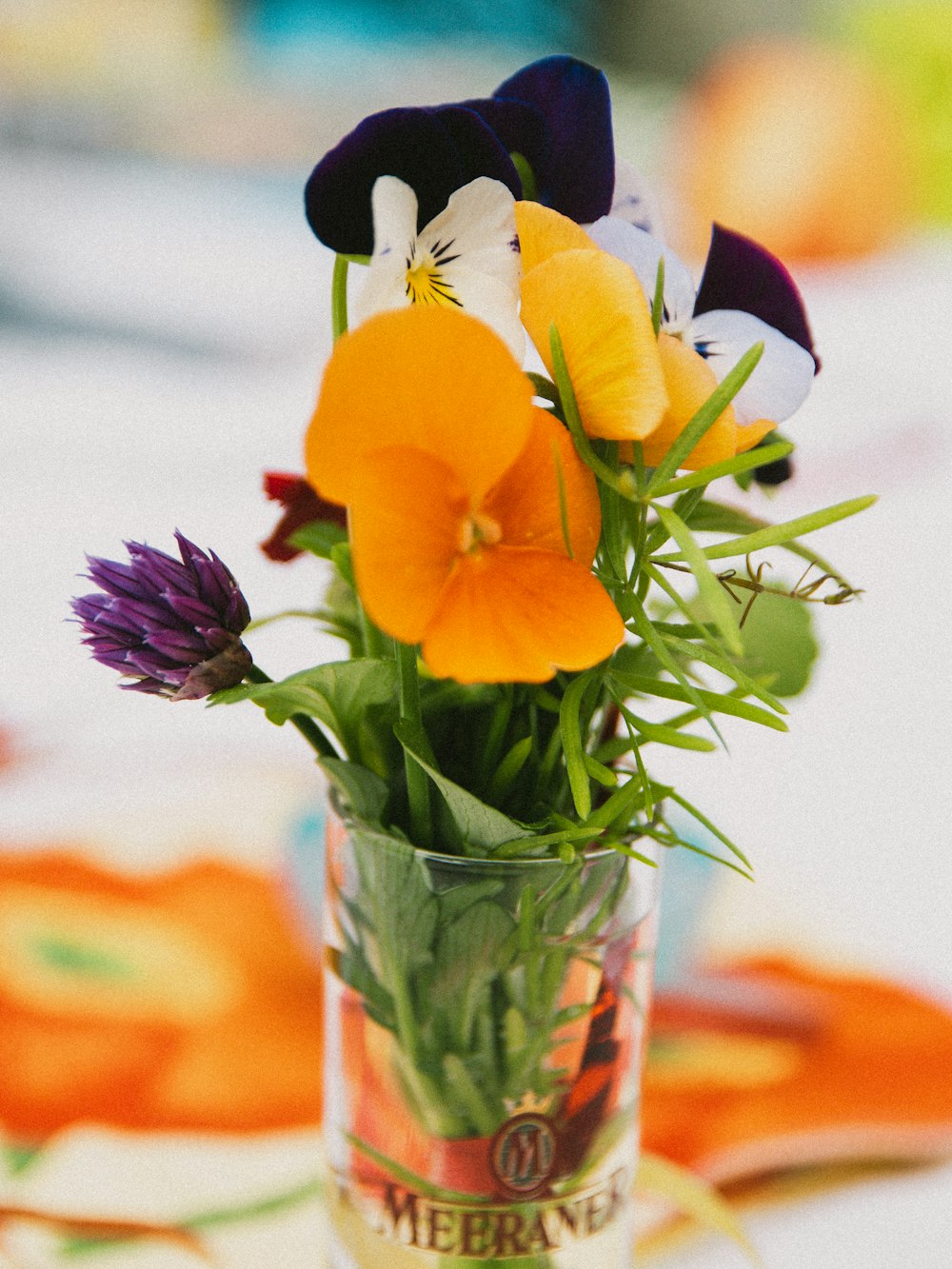 yellow daffodils in clear glass vase