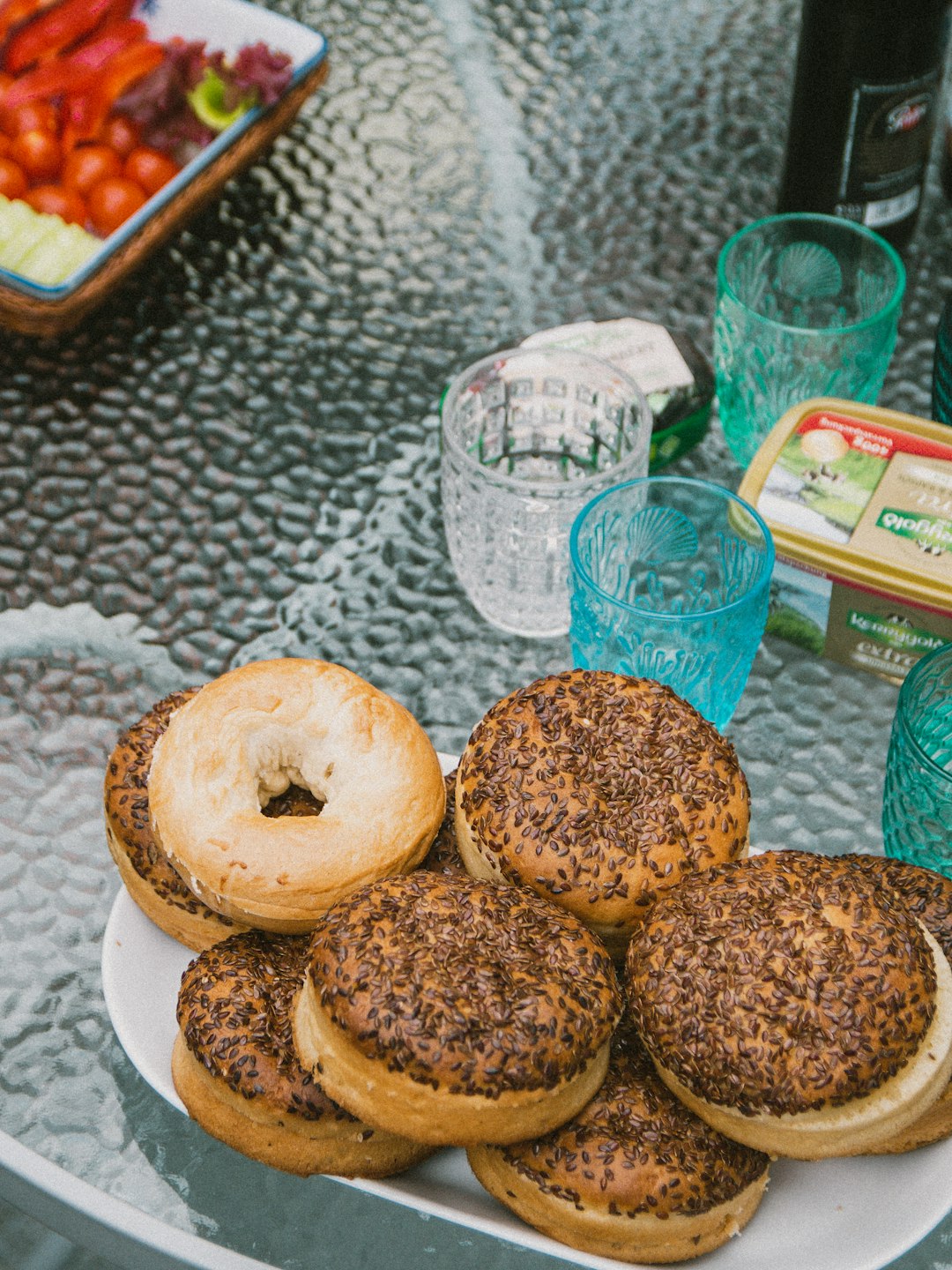 three brown doughnuts on white ceramic plate