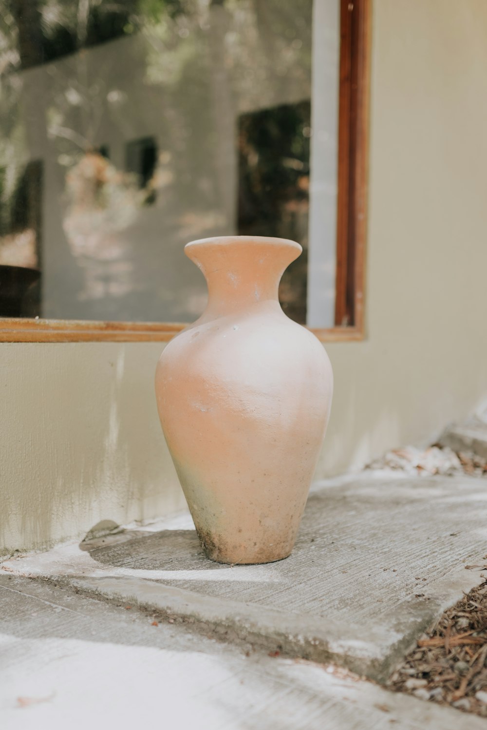 white ceramic vase on white table