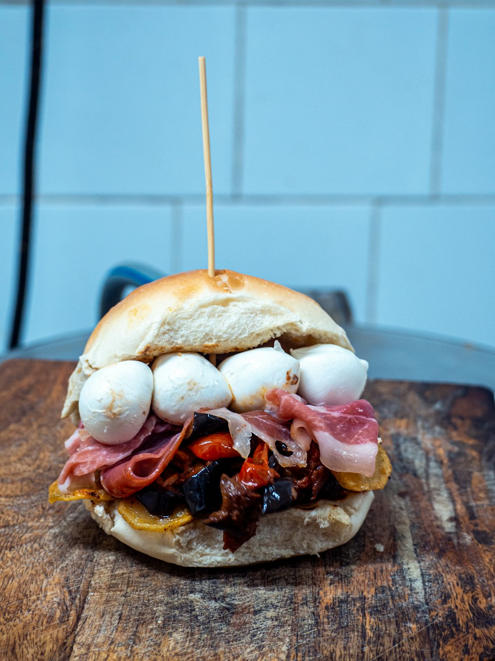 burger on brown wooden table