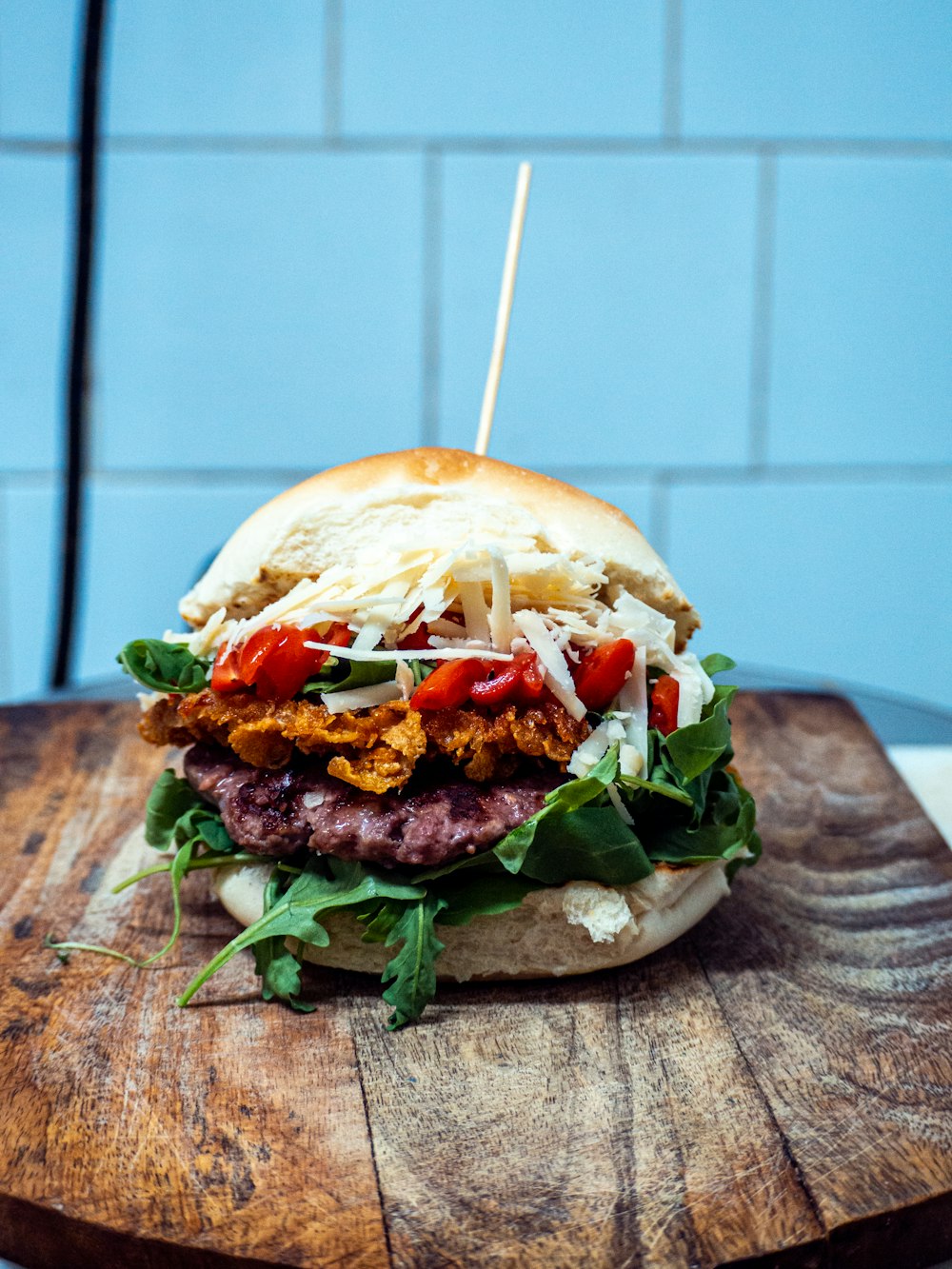 burger on brown wooden table