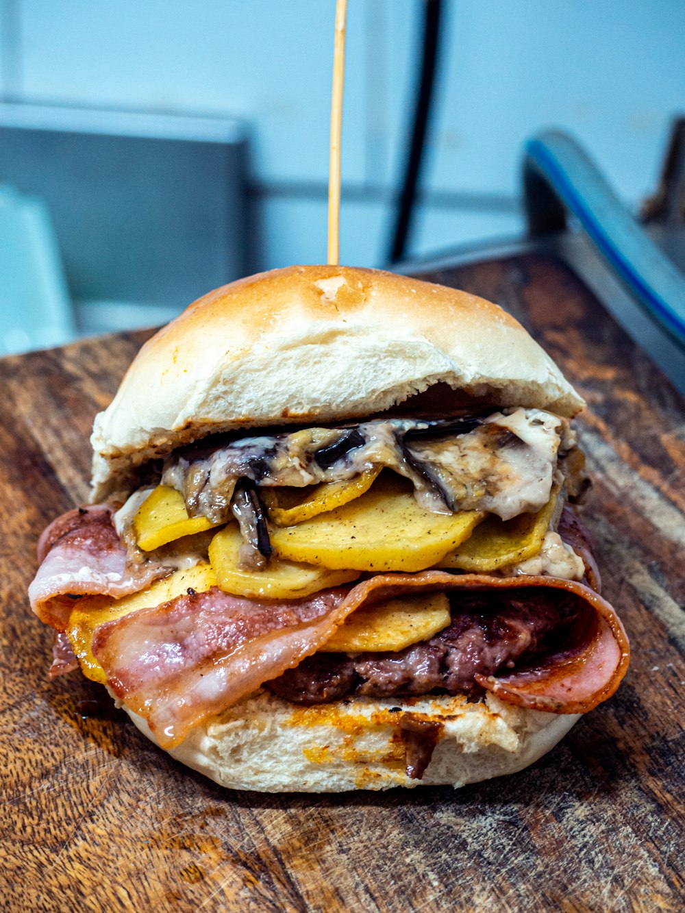 burger on blue ceramic plate