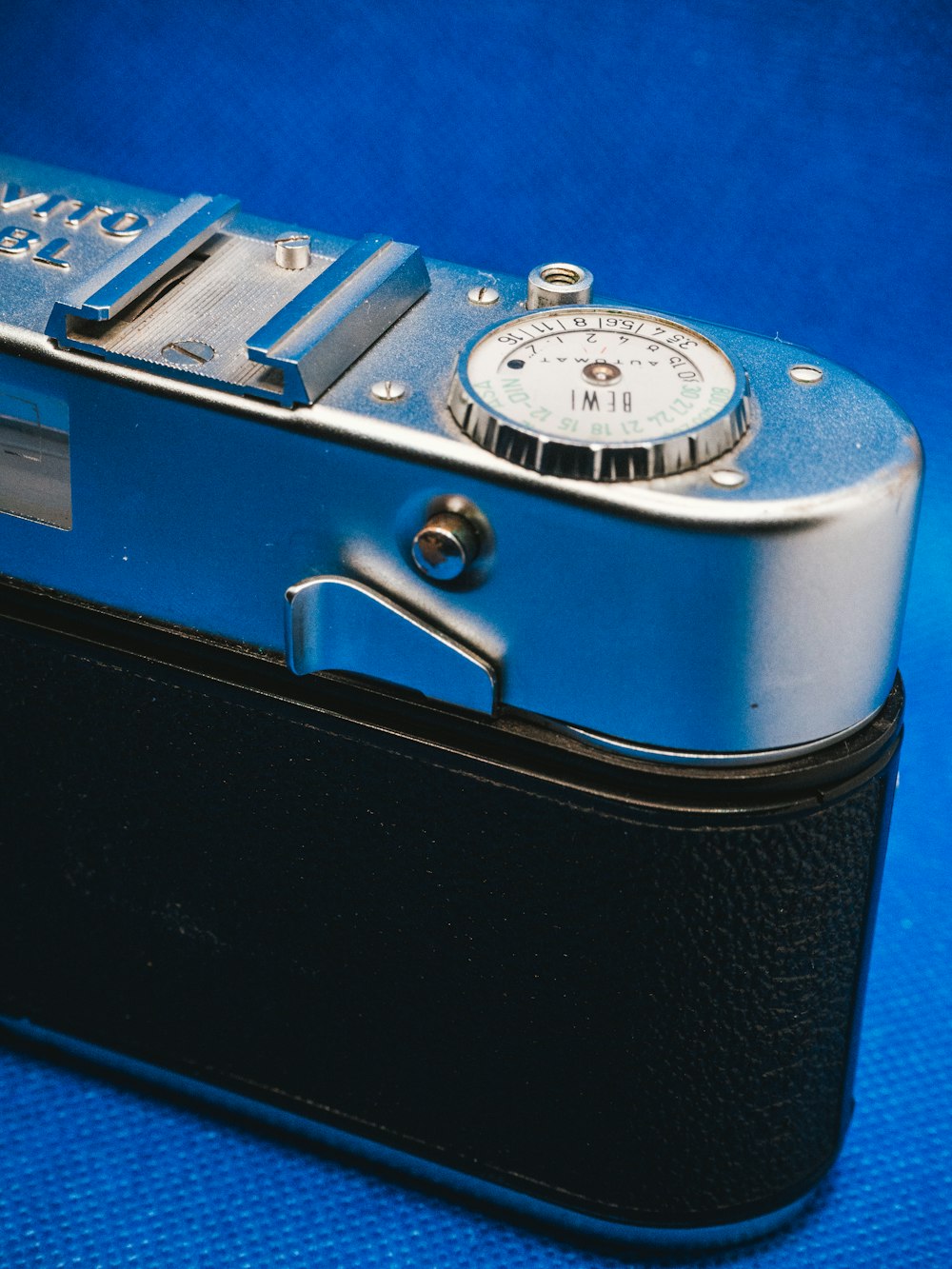 blue and silver analog watch