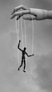 2 men playing basketball in grayscale photography