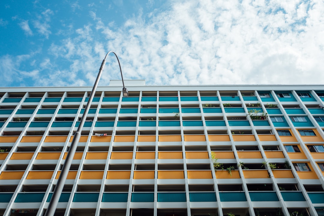 white and brown concrete building under blue sky during daytime