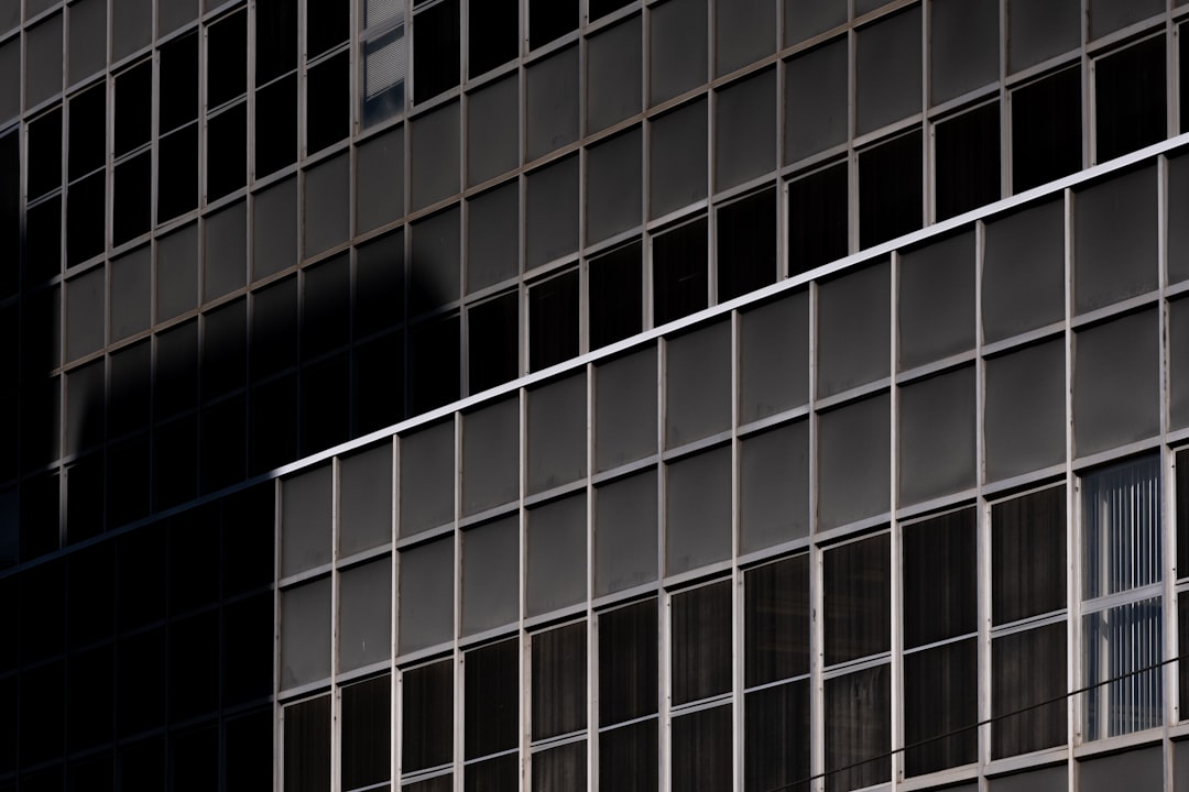 black and white glass walled building