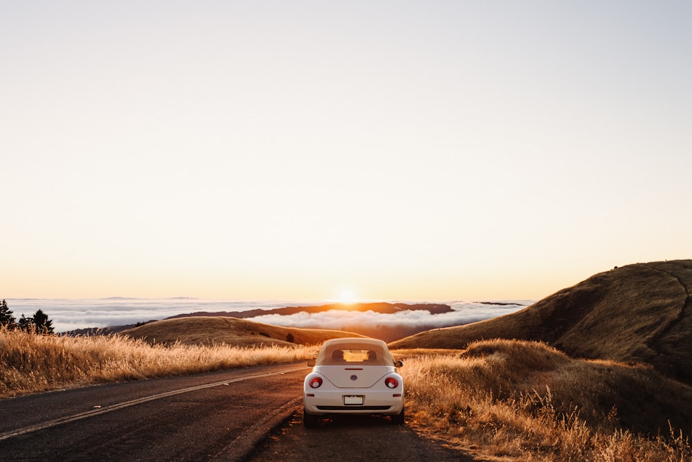 white car on road during daytime