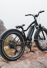 black and gray mountain bike on brown ground during daytime