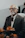 man in black suit jacket wearing eyeglasses