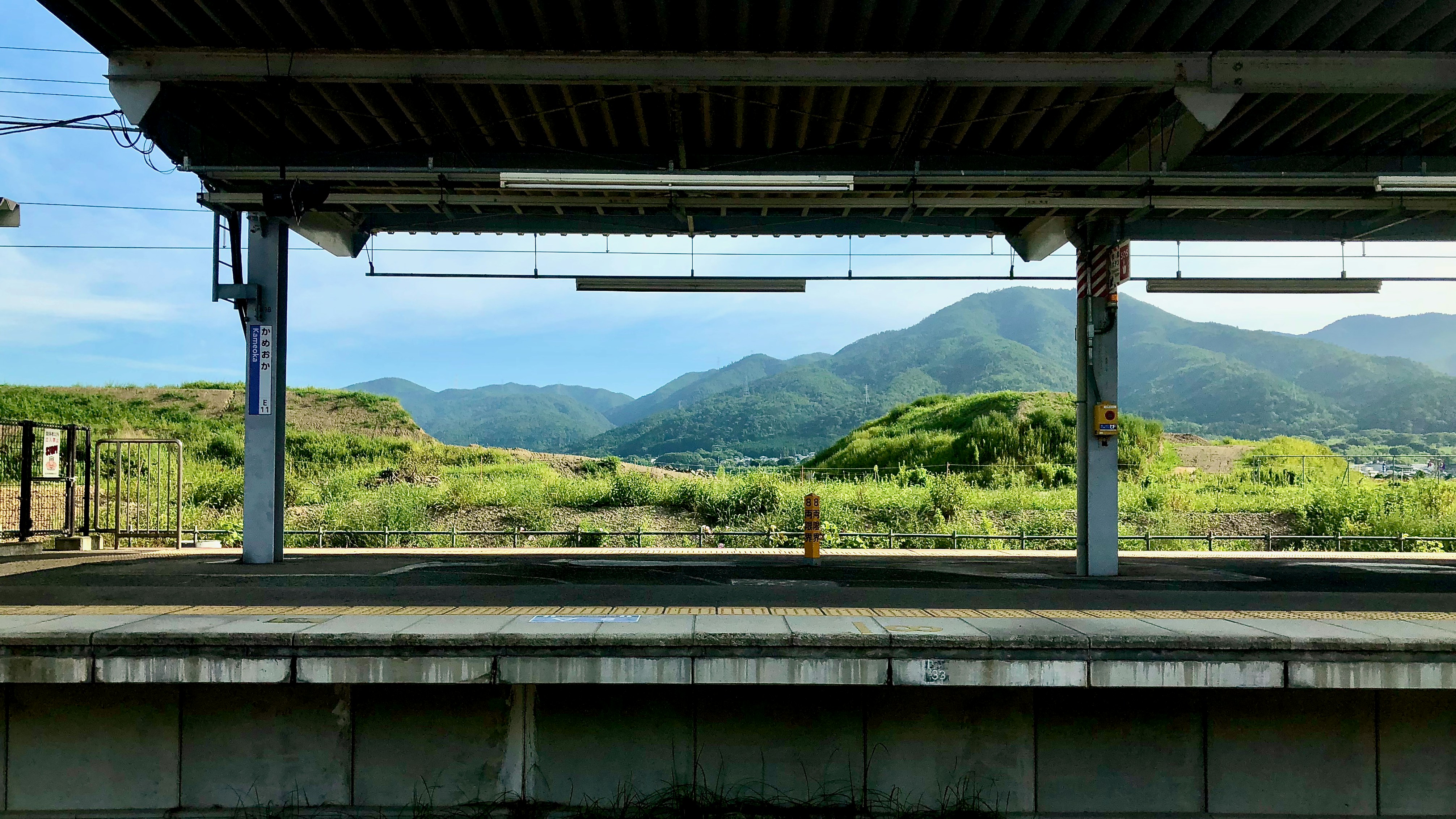 green trees and mountains during daytime, Kameoka Station　亀岡駅