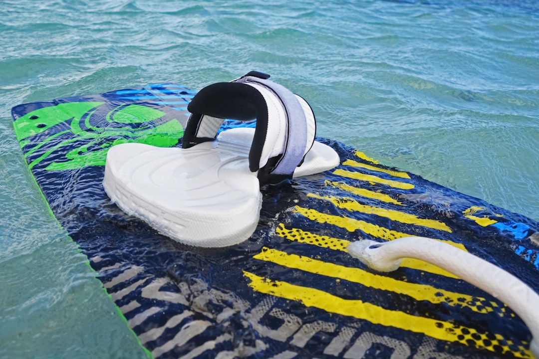 white and black inflatable ring on blue water