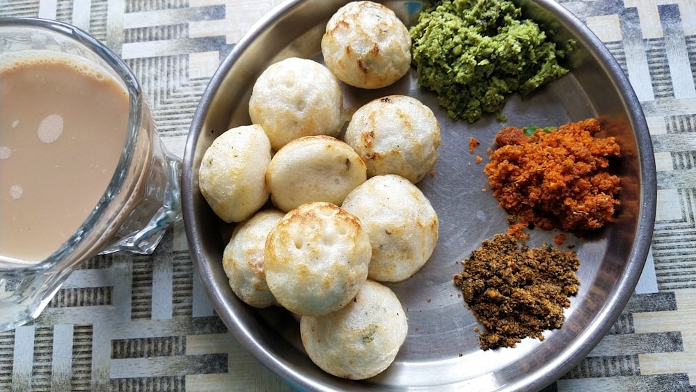 white round food on stainless steel plate