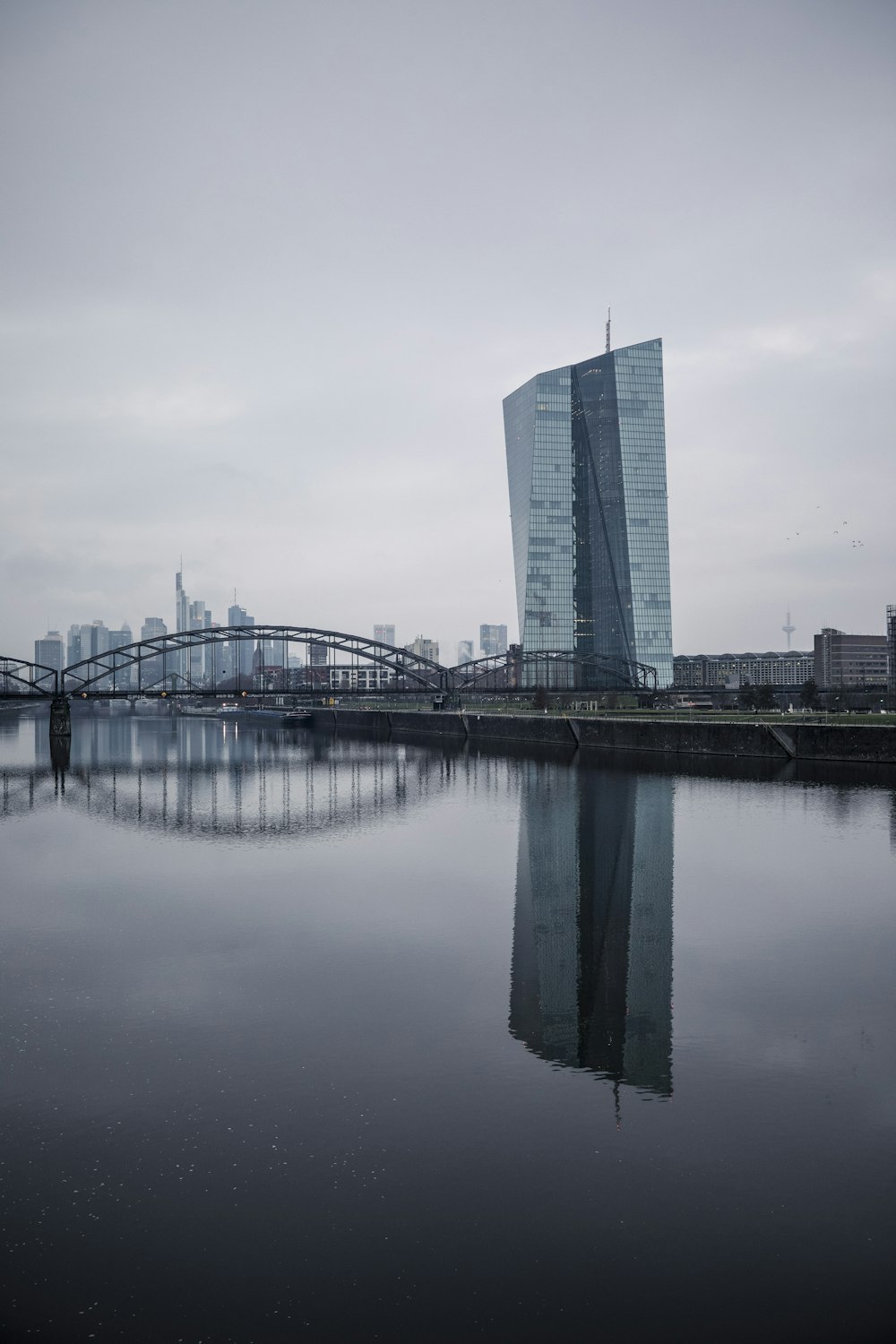 gray concrete bridge over river