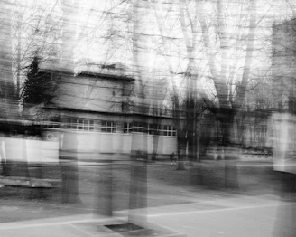 A dynamic frame capturing a government building with gray tones and subtle AI art overlays.