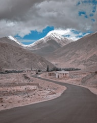 brown and white mountains under blue sky during daytime