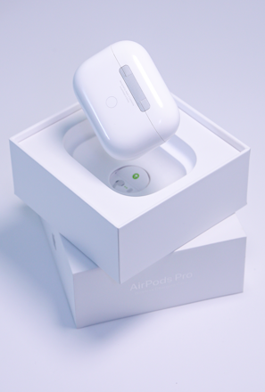 white apple airpods in box