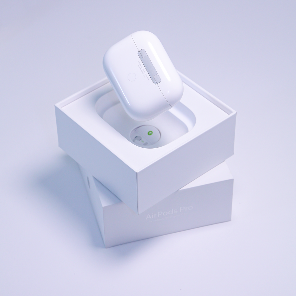 white apple airpods in box