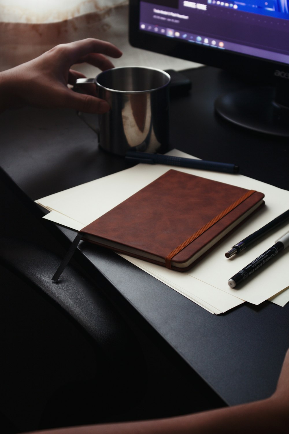 brown book on white table