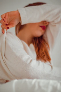 woman in white knit sweater
