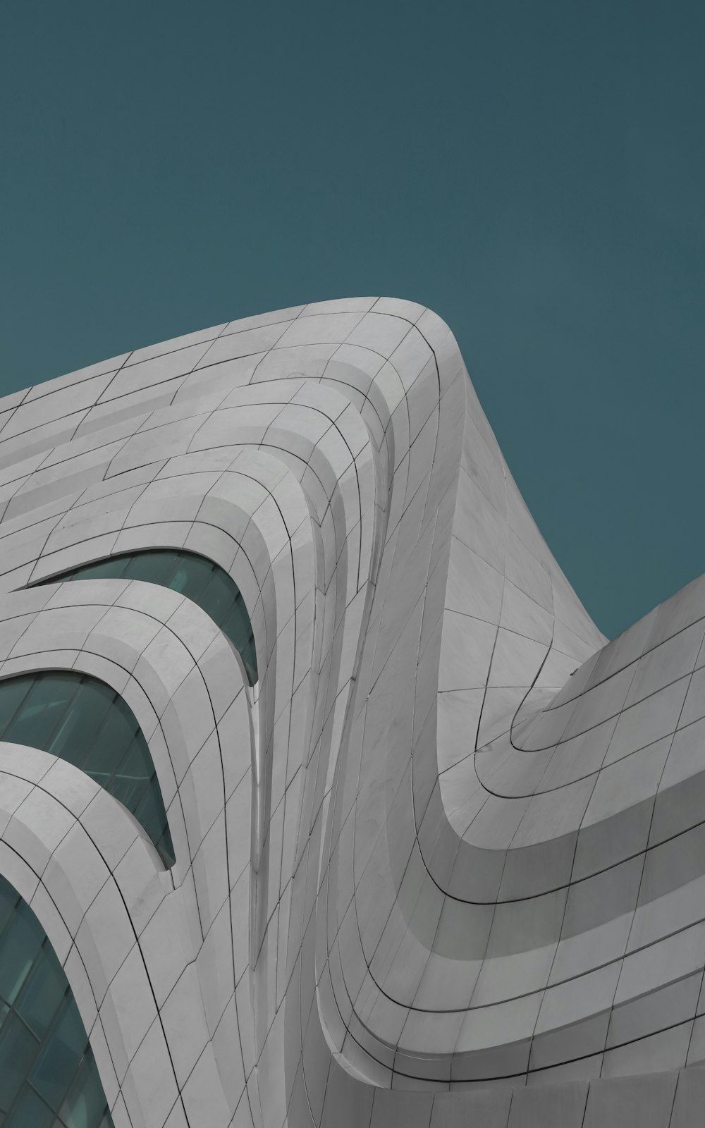 white concrete building under blue sky during daytime