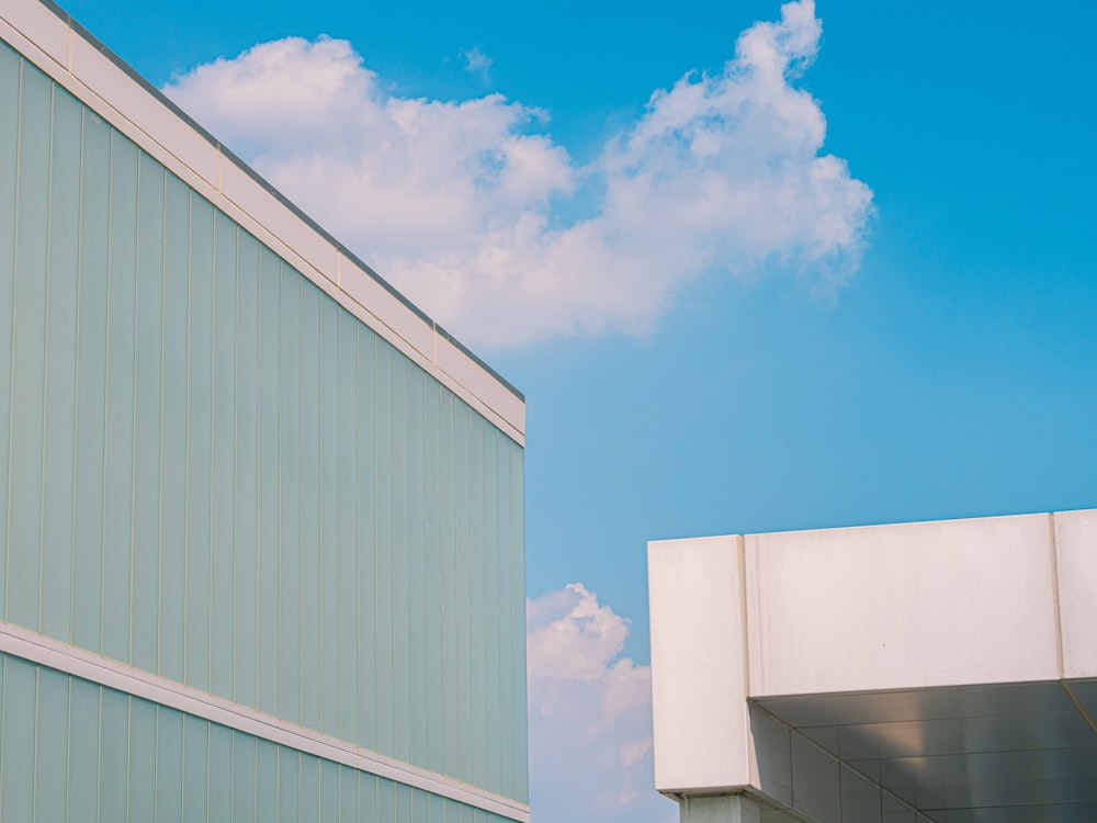 white and gray building under blue sky during daytime