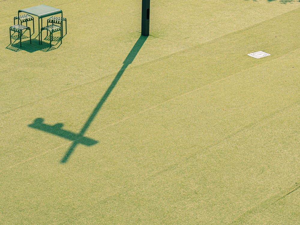 green basketball hoop on green field