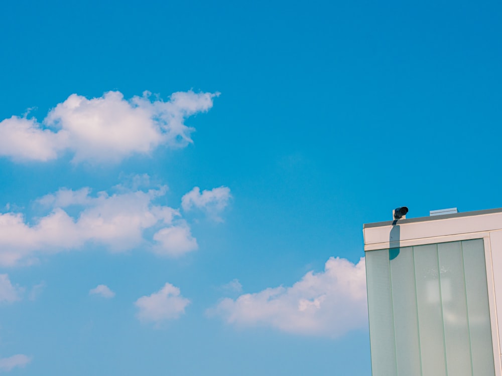 white concrete building under blue sky during daytime