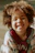 Happy child twirling in a trendy, comfortable outfit with a bright background.