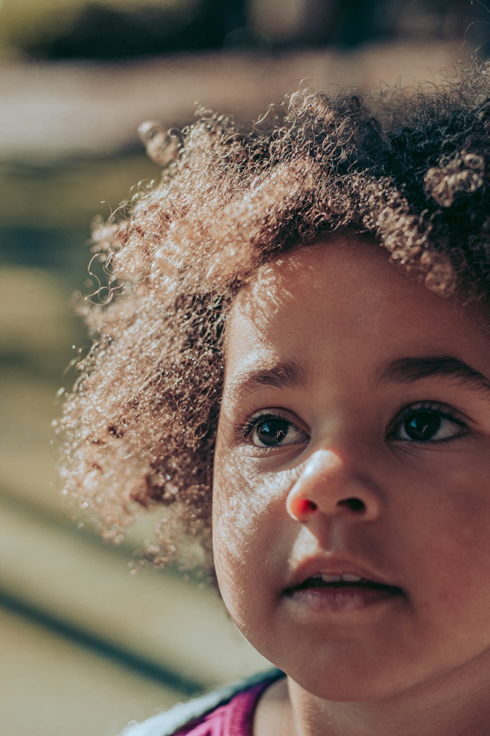 girl with brown curly hair