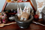 brown and white ceramic mug on brown wooden table