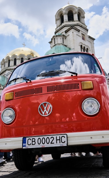 red and white volkswagen t-2