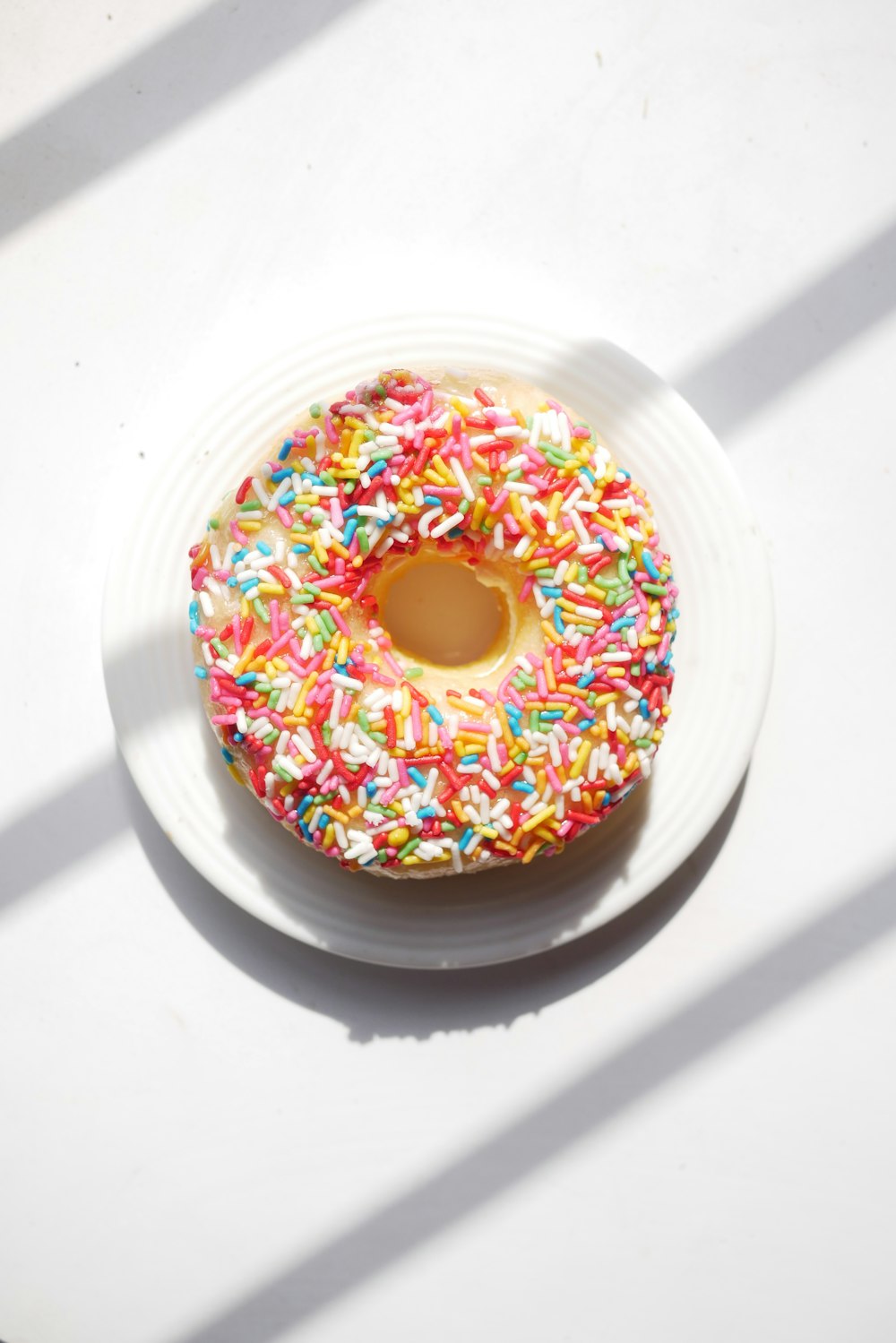 doughnut on white ceramic plate