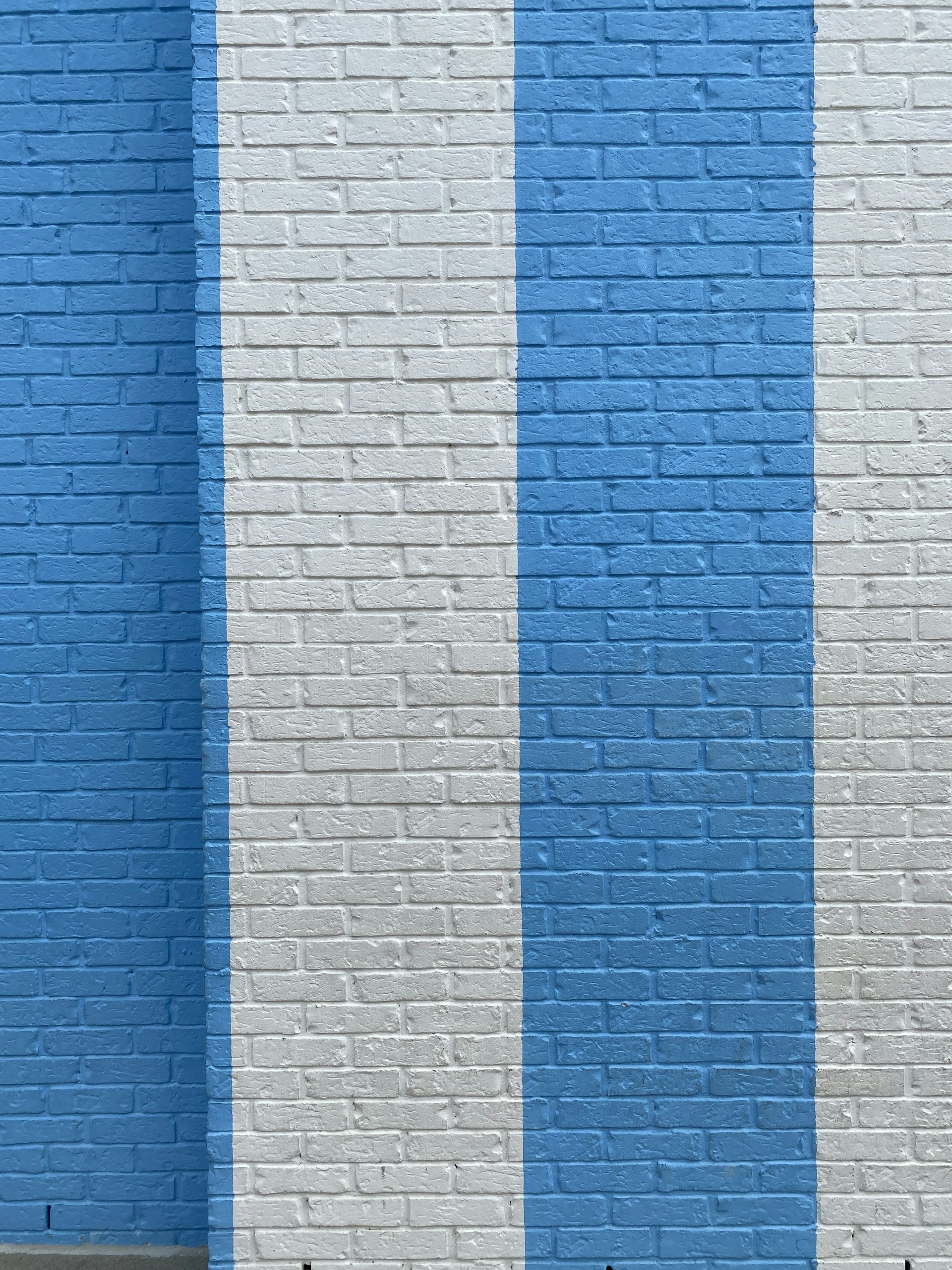 blue and white brick wall