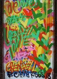 A vibrant photo with the word 'pleasher' artistically overlaid in bold, bright letters.