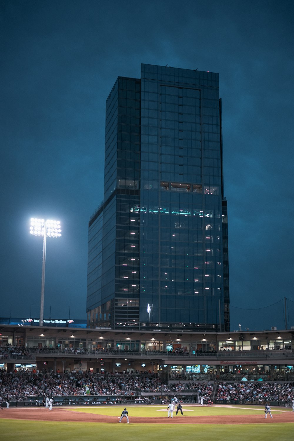 blue and black high rise building during night time