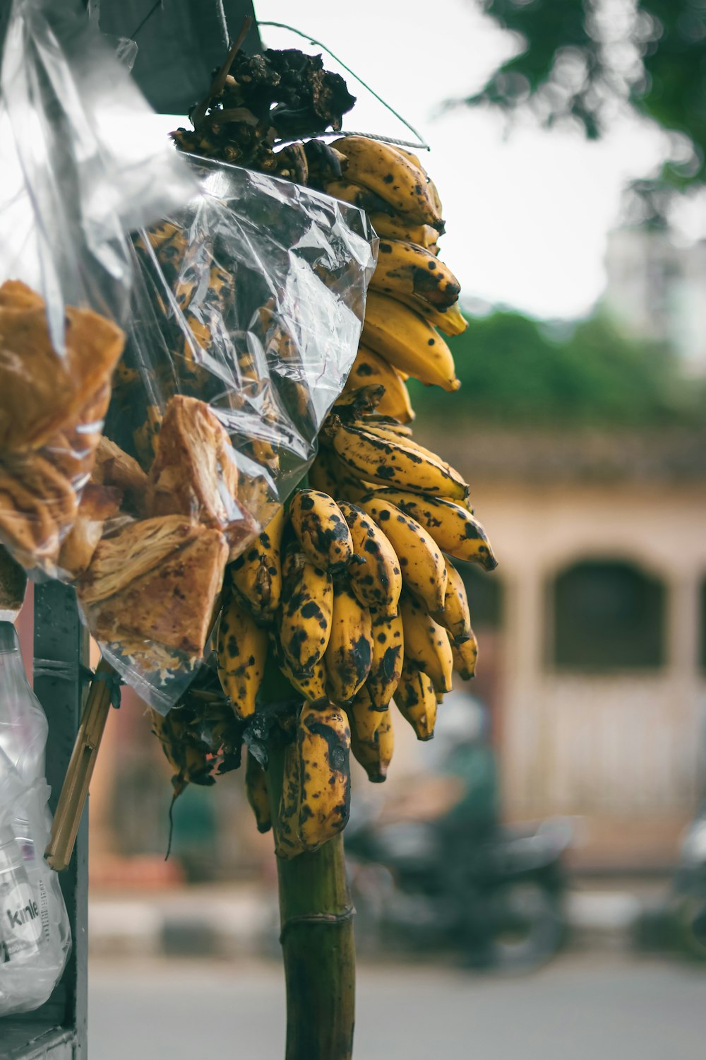 yellow banana fruit on white plastic bag