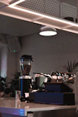 Elegant cafe interior showcasing premium espresso machines and polished countertops.