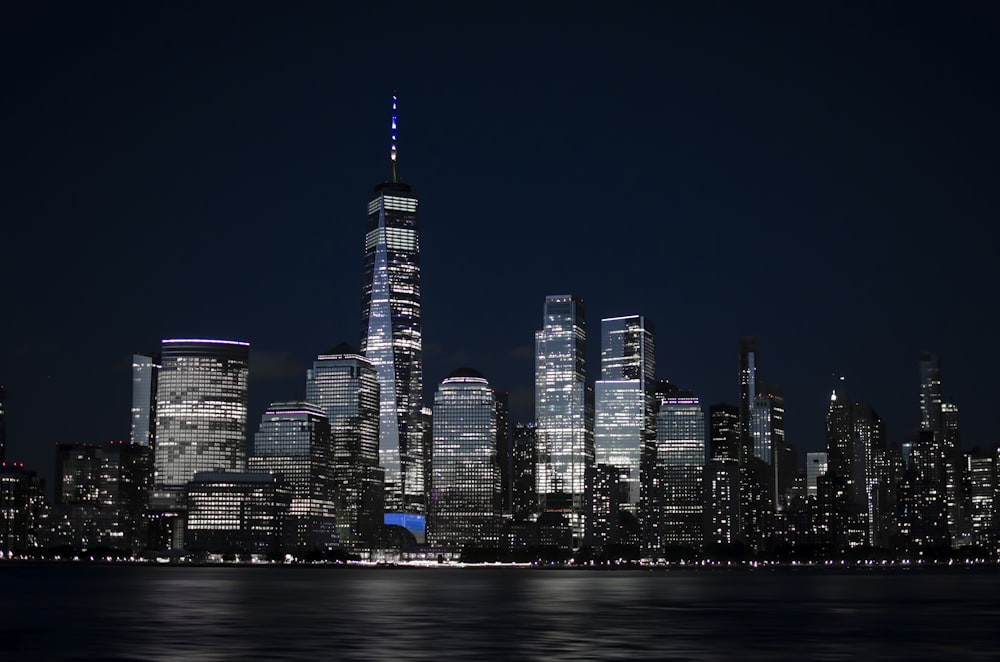 city skyline during night time