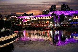 A vibrant photo of the Riverside skyline with a British flag gently waving in the foreground.