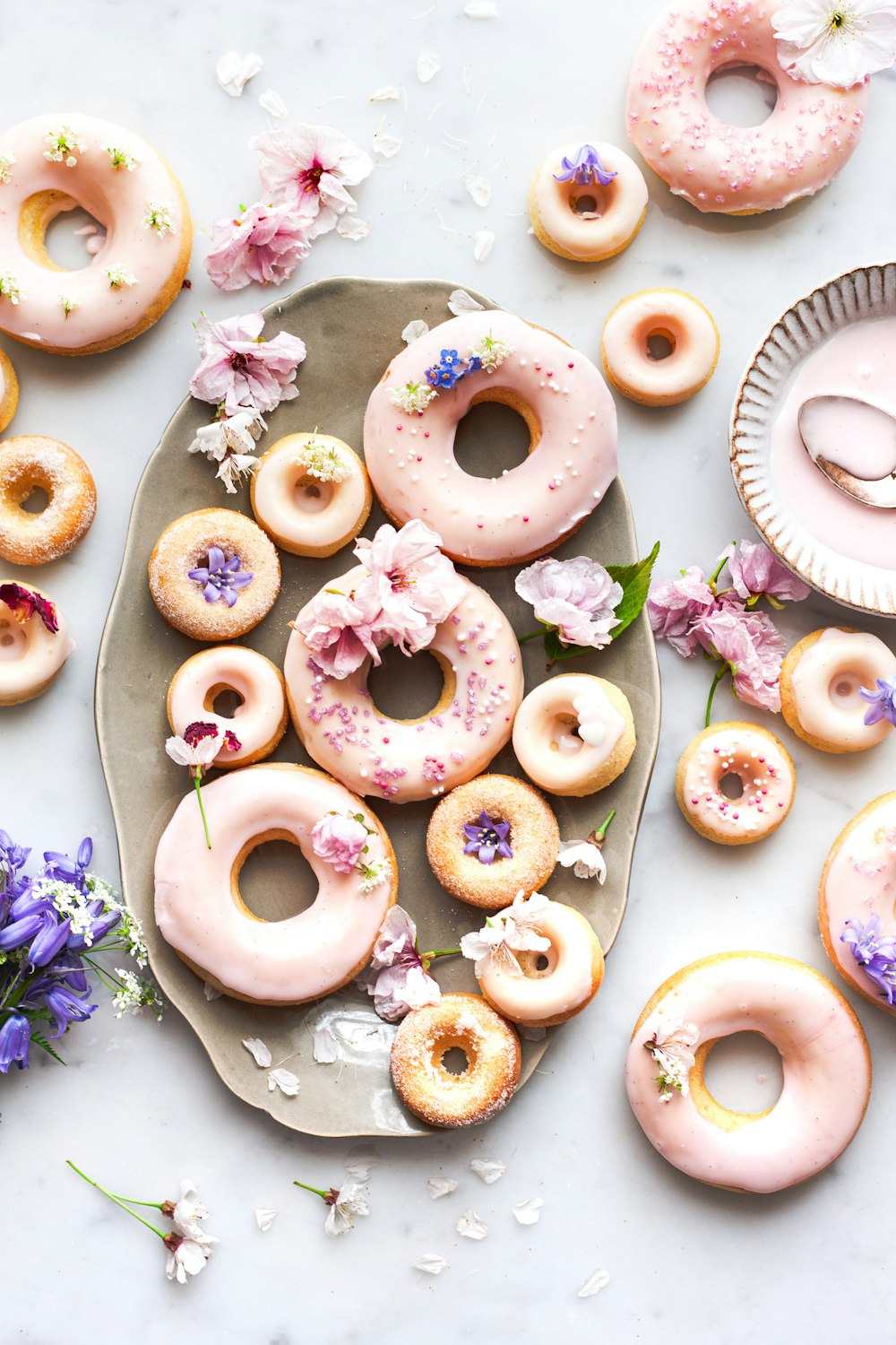 brown donut with white icing on top