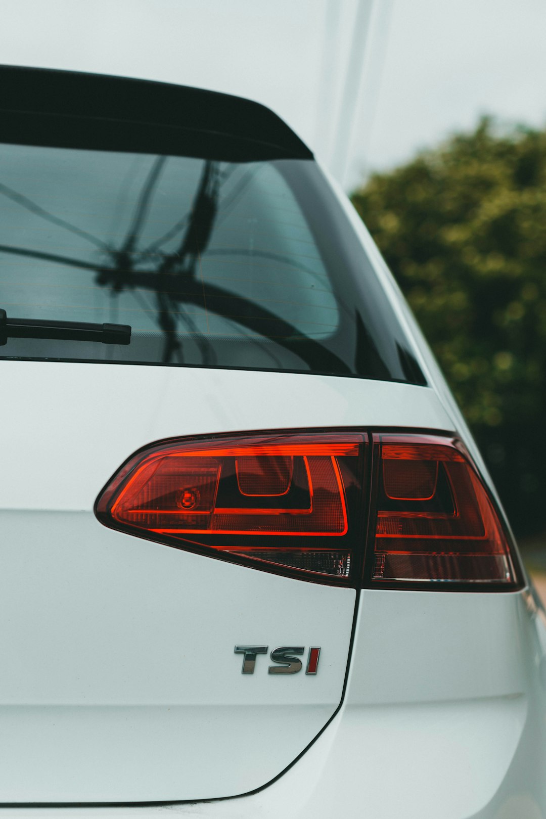 white car with red and white light