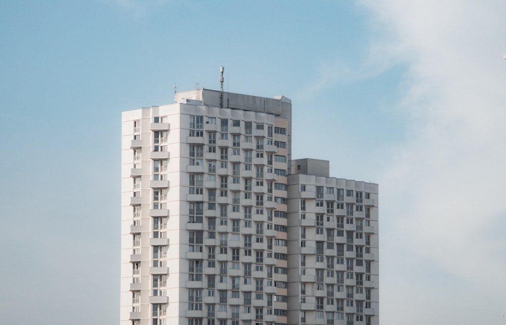 white concrete building under blue sky during daytime