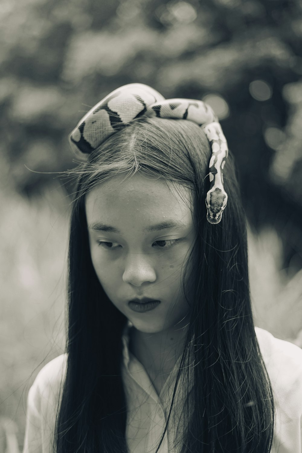 grayscale photo of girl with floral headband